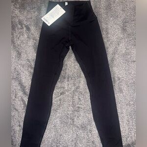 brand new slightly cropped black lululemon leggings
